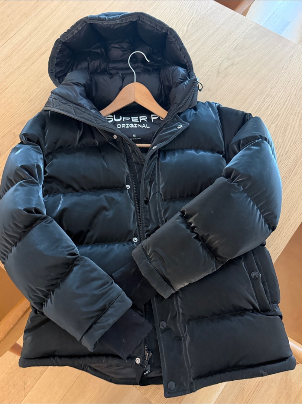 Aritzia The Super Puffer jacket. Liquid black